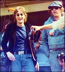 John Lennon and Harry Nilsson make an appearance at a March of Dimes benefit in Central Park.